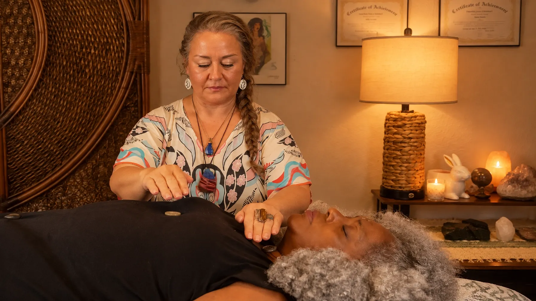 Reiki session with crystals in a warm healing room